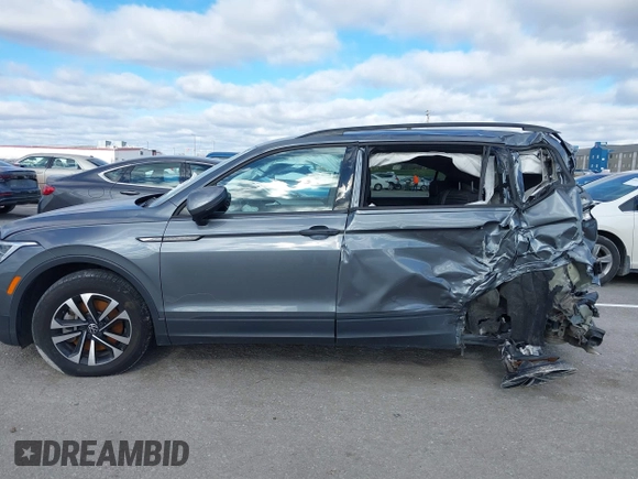 2023 Volkswagen Tiguan S with VIN 3VVRB7AXXPM033845, listed as a IAAI auction lot 40918862 with 38,122 mi miles and . Bid and sale history available at DreamBid. Image 14.