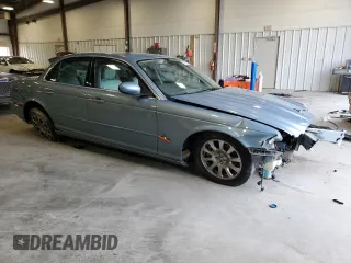 2004 Jaguar XJ with VIN SAJWA71C34SG29145, listed as a Copart auction lot 45932635 with 133,888 mi miles and Salvage Title. Bid and sale history available at carsss.com. Image 4.