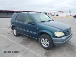 1999 Mercedes-Benz M 320/430/500 with VIN 4JGAB54E8XA055359, listed as a IAAI auction lot 41808170 with 161,573 mi miles and . Bid and sale history available at DreamBid. Image 1.