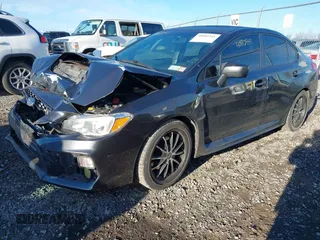 2019 Subaru WRX Premium with VIN JF1VA1C65K9800337, listed as a IAAI auction lot 40882541 with 73,405 mi miles. Bid and sale history available at carsss.com. Image 2.