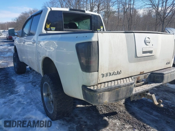 2012 Nissan Titan SV with VIN 1N6BA0EJ0CN309933, listed as a IAAI auction lot 41472091 with 147,635 mi miles. Bid and sale history available at carsss.com. Image 3.