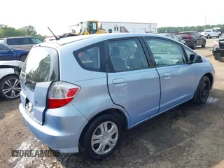 2009 Honda Fit with VIN JHMGE88209S052443, listed as a IAAI auction lot 42406572 with 140,343 mi miles and . Bid and sale history available at DreamBid. Image 4.