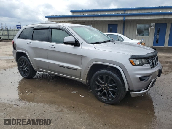 2018 Jeep Grand Cherokee Laredo с VIN 1C4RJFAG7JC217662, выставлен на аукционе Copart как лот 51811485 с пробегом 75 662 миль миль и Списание • Salvage title. История ставок и продаж доступна на DreamBid. Изображение 4.