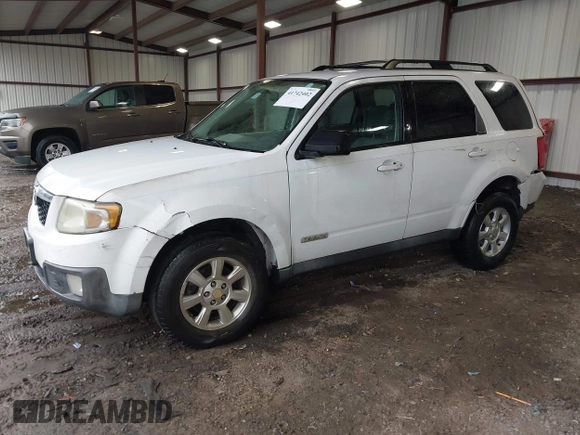 2008 Mazda Tribute ES with VIN 4F2CZ06148KM13459, listed as a IAAI auction lot 41742402 with 196,030 mi miles and . Bid and sale history available at DreamBid. Image 2.