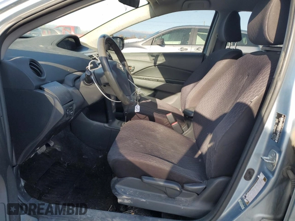 2010 Toyota Yaris с VIN JTDBT4K34A1392443, выставлен на аукционе Copart как лот 51072225 с пробегом 200 133 миль миль и Списание • Salvage title. История ставок и продаж доступна на DreamBid. Изображение 7.