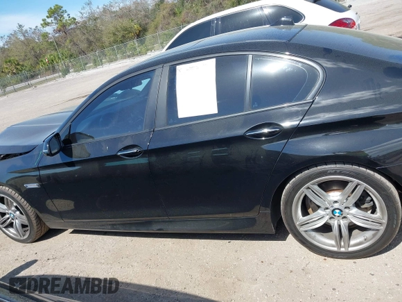 2014 BMW 5 Series 535d with VIN WBAXA5C58ED690447, listed as a IAAI auction lot 41577468 with 149,080 mi miles and . Bid and sale history available at carsss.com. Image 15.