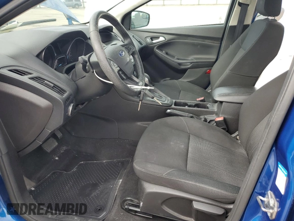 2018 Ford Focus SE z VIN 1FADP3F27JL260280, wystawiony jako Copart lot #54690975 z przebiegiem 73 322 mil mil oraz Szkoda całkowita • Salvage title. Historia ofert i sprzedaży dostępna na DreamBid. Obrazek 7.