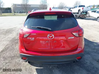 2016 Mazda CX-5 Touring with VIN JM3KE4CY5G0816285, listed as a IAAI auction lot 41888537 with 101,598 mi miles. Bid and sale history available at carsss.com. Image 16.