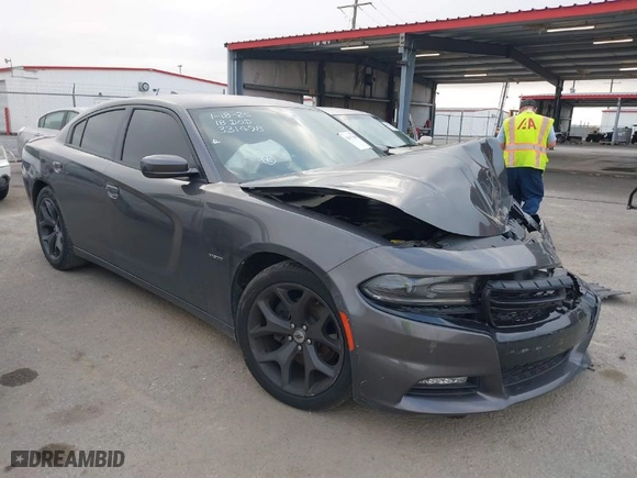 2018 Dodge Charger R/T with VIN 2C3CDXCT0JH331498, listed as a IAAI auction lot 41477060 with 129,116 mi miles. Bid and sale history available at carsss.com. Image 1.