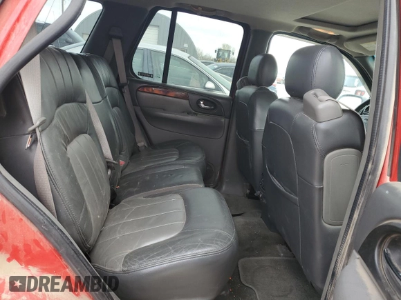 2002 GMC Envoy SLT z VIN 1GKDT13S022212095, wystawiony jako Copart lot #51253585 z przebiegiem 194 767 mil mil oraz Szkoda całkowita • Salvage title. Historia ofert i sprzedaży dostępna na DreamBid. Obrazek 11.