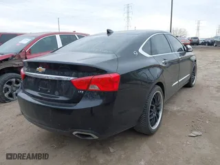 2015 Chevrolet Impala LTZ with VIN 1G1165S32FU141346, listed as a IAAI auction lot 41681418 with 146,823 mi miles. Bid and sale history available at carsss.com. Image 4.