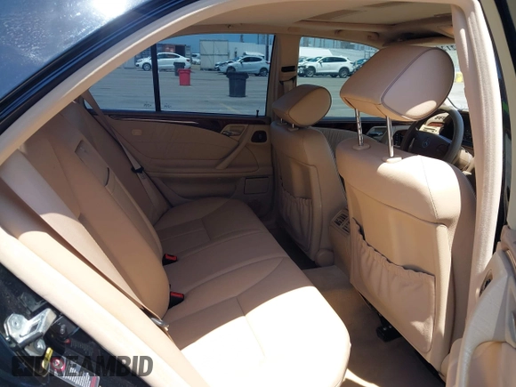 2002 Mercedes-Benz E-Class with VIN WDBJF65J62B404868, listed as a IAAI auction lot 42121837 with 107,415 mi miles. Bid and sale history available at carsss.com. Image 8.