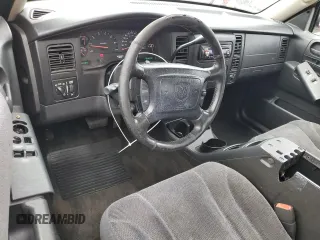 2003 Dodge Dakota SLT with VIN 1D7HL42N93S105421, listed as a Copart auction lot 83088264 with 210,194 mi miles and Salvage Title. Bid and sale history available at carsss.com. Image 8.