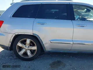 2011 Jeep Grand Cherokee Overland with VIN 1J4RR6GT6BC568491, listed as a IAAI auction lot 42035464 with 147,389 mi miles. Bid and sale history available at carsss.com. Image 6.