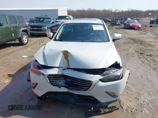 2016 Mazda CX-3 Grand Touring with VIN JM1DKFD76G0134205, listed as a IAAI auction lot 41661904 with 190,368 mi miles. Bid and sale history available at carsss.com. Image 12.