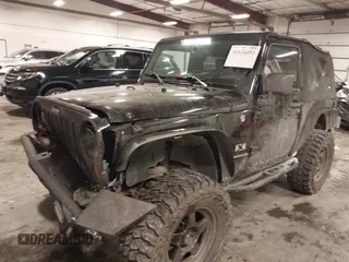 2007 Jeep Wrangler X with VIN 1J4FA24117L126599, listed as a IAAI auction lot 41624453 with 86,963 mi miles and . Bid and sale history available at carsss.com. Image 2.