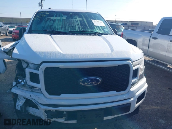 2019 Ford F-150 XL with VIN 1FTEW1CPXKKF00869, listed as a IAAI auction lot 41197442 with 77,487 mi miles and . Bid and sale history available at DreamBid. Image 12.