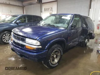2005 Chevrolet Blazer Xtreme z VIN 1GNCS18X65K101710, wystawiony jako Copart lot #76982844 z przebiegiem 129 988 mil mil oraz Szkoda całkowita • Salvage title. Historia ofert i sprzedaży dostępna na DreamBid. Obrazek 1.