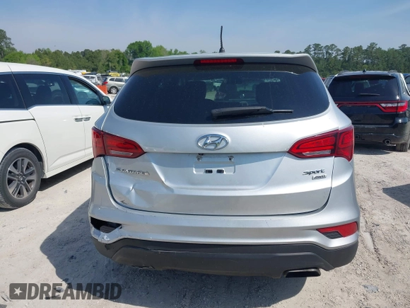 2018 Hyundai Santa Fe 2.4L z VIN 5XYZTDLB9JG513584, wystawiony jako IAAI lot #42031291 z przebiegiem 131 109 mil mil oraz . Historia ofert i sprzedaży dostępna na DreamBid. Obrazek 16.