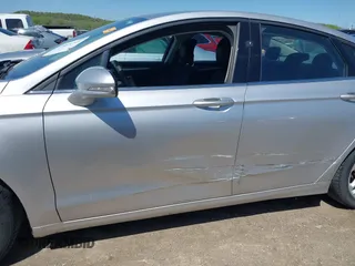 2014 Ford Fusion SE with VIN 1FA6P0H77E5400628, listed as a IAAI auction lot 42001344 with 192,511 mi miles and . Bid and sale history available at DreamBid. Image 6.