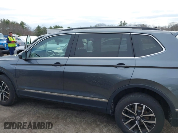 2021 Volkswagen Tiguan SE with VIN 3VV2B7AX6MM054611, listed as a IAAI auction lot 41978323 with 23,029 mi miles and . Bid and sale history available at DreamBid. Image 14.