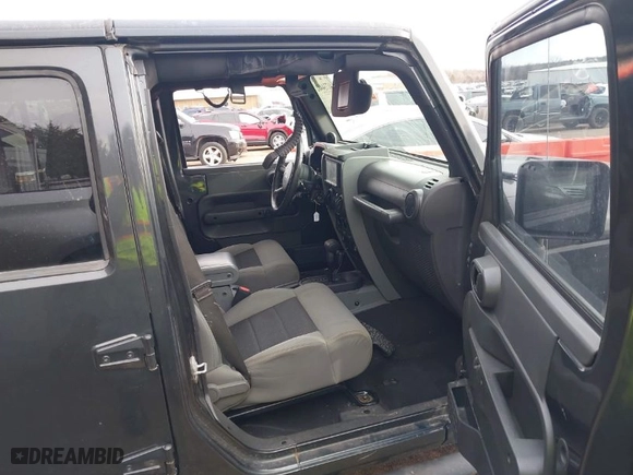 2010 Jeep Wrangler Unlimited Sport with VIN 1J4BA3H13AL125010, listed as a IAAI auction lot 41734482 with 183,773 mi miles. Bid and sale history available at carsss.com. Image 5.