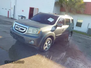 2009 Honda Pilot EX-L with VIN 5FNYF48579B014520, listed as a IAAI auction lot 41736577 with 204,704 mi miles. Bid and sale history available at carsss.com. Image 2.