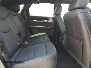 2023 Cadillac XT5 FWD Premium Luxury with VIN 1GYKNCRS3PZ135585, listed as a Copart auction lot 58891914 with 32,325 mi miles and Salvage Title. Bid and sale history available at carsss.com. Image 10.