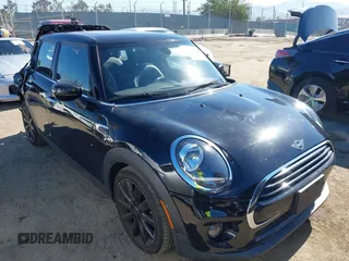 2020 MINI Hardtop 4 Door Cooper with VIN WMWXU7C06L2M26613, listed as a IAAI auction lot 42713667 with 83,887 mi miles and . Bid and sale history available at DreamBid. Image 1.