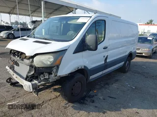 2015 Ford Transit Cargo with VIN 1FTYR1ZM7FKB05121, listed as a IAAI auction lot 41461900 with 190,821 mi miles and . Bid and sale history available at DreamBid. Image 17.