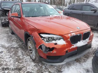 2015 BMW X1 xDrive28i with VIN WBAVL1C51FVY33650, listed as a IAAI auction lot 41400985 with 132,484 mi miles. Bid and sale history available at carsss.com. Image 22.