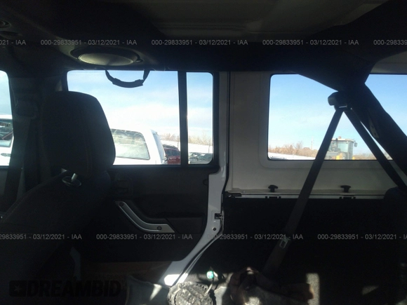 2013 Jeep Wrangler Unlimited Rubicon 10th Anniversary with VIN 1C4HJWFG0DL681417, listed as a IAAI auction lot 29833951 with 118,673 mi miles and . Bid and sale history available at DreamBid. Image 8.