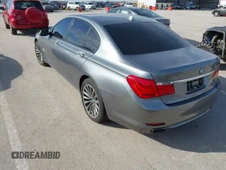 2009 BMW 7 Series 750i with VIN WBAKA83599CY34420, listed as a IAAI auction lot 41448738 with 105,141 mi miles. Bid and sale history available at carsss.com. Image 3.