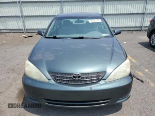 2004 Toyota Camry LE z VIN 4T1BE32K34U294224, wystawiony jako Copart lot #59581595 z przebiegiem 188 034 mil mil oraz Szkoda całkowita • Salvage title. Historia ofert i sprzedaży dostępna na DreamBid. Obrazek 5.