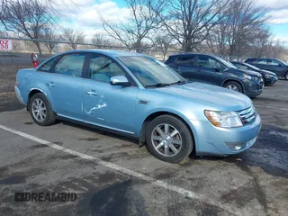2008 Ford Taurus SEL with VIN 1FAHP27WX8G157077, listed as a IAAI auction lot 41499882 with 113,039 mi miles. Bid and sale history available at carsss.com. Image 1.