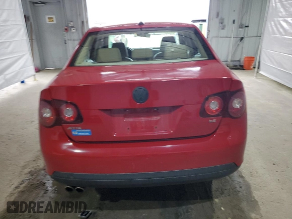 2009 Volkswagen Jetta SE z VIN 3VWRZ71K69M011873, wystawiony jako Copart lot #52881525 z przebiegiem 154 441 mil mil oraz Szkoda całkowita • Salvage title. Historia ofert i sprzedaży dostępna na DreamBid. Obrazek 6.