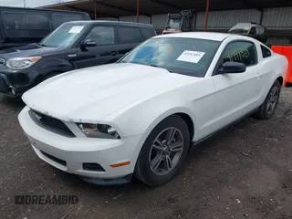 2011 Ford Mustang V6 with VIN 1ZVBP8AM9B5166461, listed as a IAAI auction lot 41997889 with 186,366 mi miles and . Bid and sale history available at carsss.com. Image 2.