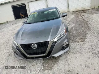2019 Nissan Altima SV z VIN 1N4BL4DW9KN301934, wystawiony jako Copart lot #59717785 z przebiegiem 162 905 mil mil oraz Szkoda całkowita • Salvage title. Historia ofert i sprzedaży dostępna na DreamBid. Obrazek 13.