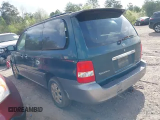 2005 Kia Sedona LX with VIN KNDUP132X56735119, listed as a IAAI auction lot 41798736 with 196,460 mi miles. Bid and sale history available at carsss.com. Image 3.