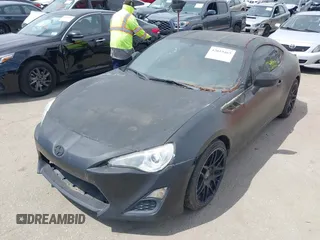2015 Scion FR-S with VIN JF1ZNAA12F8712371, listed as a IAAI auction lot 42019465 with 21 mi miles. Bid and sale history available at carsss.com. Image 6.