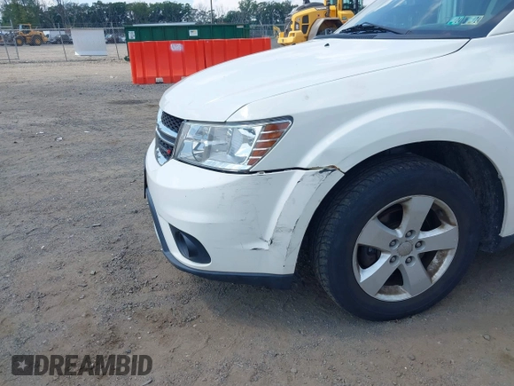 2012 Dodge Journey SXT with VIN 3C4PDDBG3CT307500, listed as a IAAI auction lot 42728446 with 122,072 mi miles and . Bid and sale history available at DreamBid. Image 6.