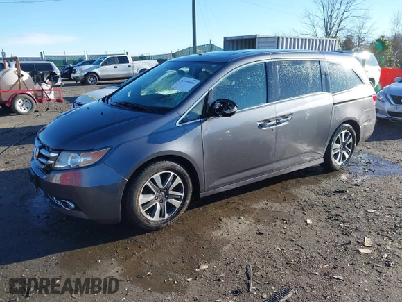 2014 Honda Odyssey Touring with VIN 5FNRL5H94EB081267, listed as a IAAI auction lot 41199509 with 146,827 mi miles and . Bid and sale history available at DreamBid. Image 17.