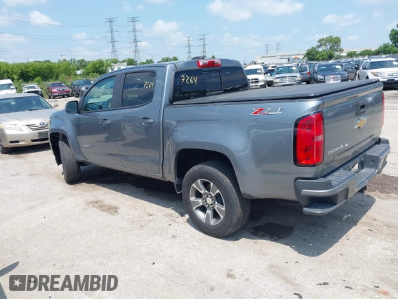 2018 Chevrolet Colorado 4WD Z71 with VIN 1GCGTDENXJ1247717, listed as a IAAI auction lot 42557264 with 91,463 mi miles and . Bid and sale history available at DreamBid. Image 3.