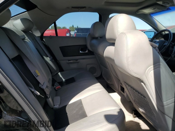 2005 Cadillac CTS z VIN 1G6DP567350157367, wystawiony jako Copart lot #52534565 z przebiegiem 147 959 mil mil oraz Szkoda całkowita • Salvage title. Historia ofert i sprzedaży dostępna na DreamBid. Obrazek 10.