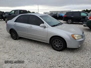 2006 Kia Spectra EX with VIN KNAFE121X65333208, listed as a Copart auction lot 70634994 with 145,288 mi miles and Salvage Title. Bid and sale history available at carsss.com. Image 4.