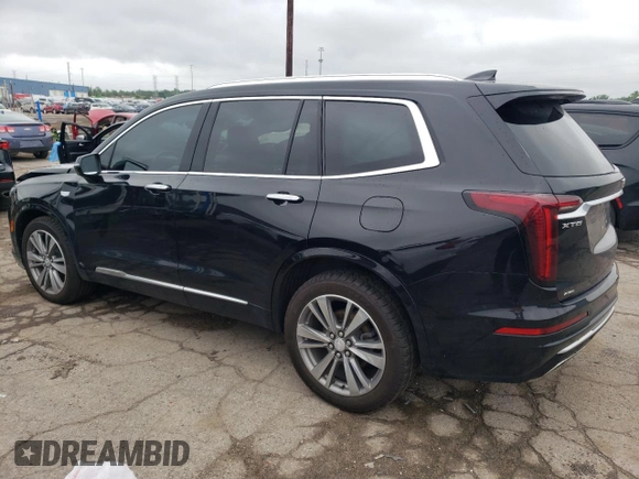 2021 Cadillac XT6 Premium Luxury with VIN 1GYKPDRS9MZ209989, listed as a Copart auction lot 64770124 with 90,115 mi miles and Non Repairable. Bid and sale history available at carsss.com. Image 2.