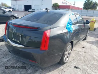 2013 Cadillac ATS Luxury z VIN 1G6AB5RA4D0149849, wystawiony jako IAAI lot #41754315 z przebiegiem 107 490 mil mil oraz . Historia ofert i sprzedaży dostępna na DreamBid. Obrazek 4.