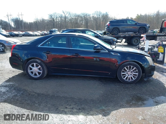2012 Cadillac CTS with VIN 1G6DC5E5XC0144060, listed as a IAAI auction lot 41596919 with 108,151 mi miles and . Bid and sale history available at DreamBid. Image 13.