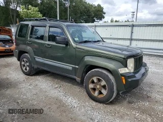 2008 Jeep Liberty Sport with VIN 1J8GN28K18W133787, listed as a Copart auction lot 54674995 with 127,377 mi miles and Non Repairable. Bid and sale history available at carsss.com. Image 4.