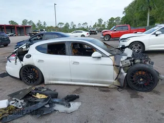 2016 Porsche Panamera 4 z VIN WP0AA2A78GL006176, wystawiony jako IAAI lot #41987545 z przebiegiem Nie podano mil oraz . Historia ofert i sprzedaży dostępna na DreamBid. Obrazek 13.